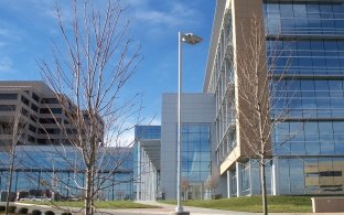Edward Jones South Campus building exterior, walkways, landscape and light pole