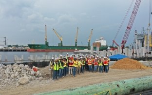 Group of people at a marine jobsite