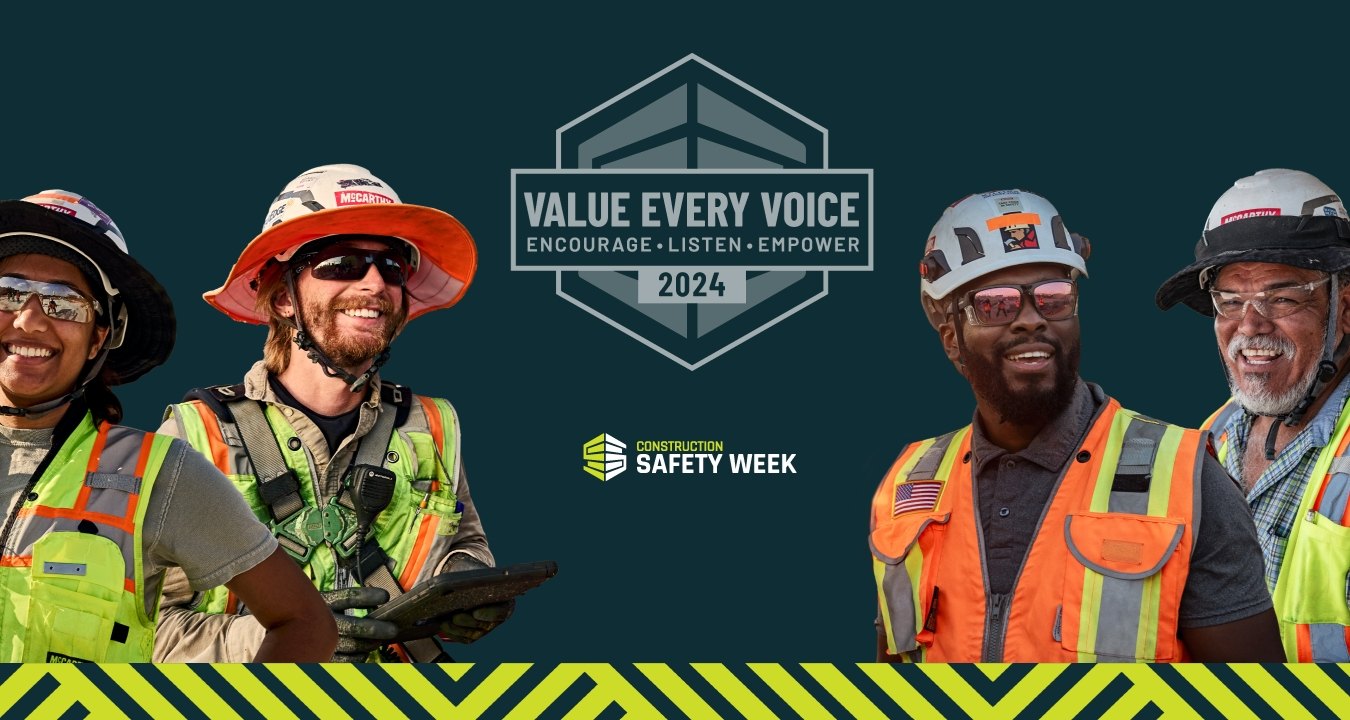 Four people surrounding the Construction Safety Week logo