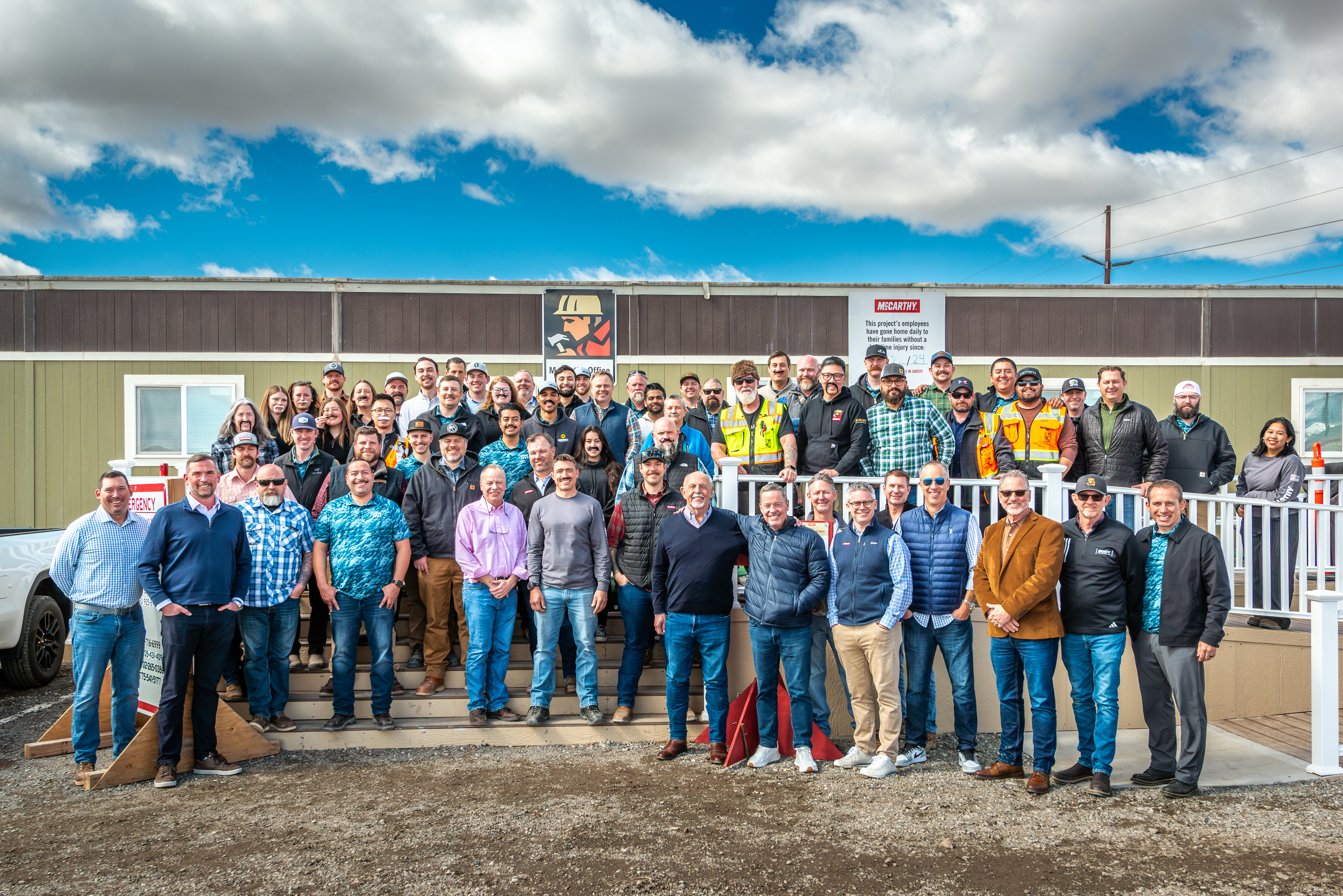McCarthy team outside trailer.