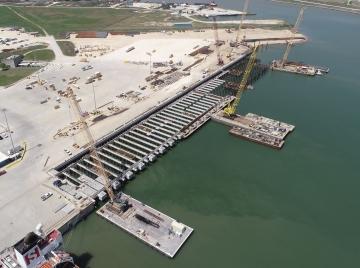 Aerial view of a port terminal under construction.