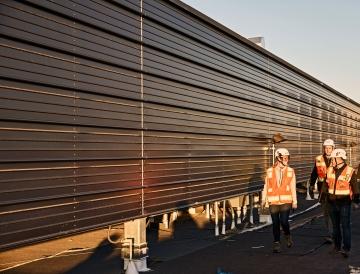 People walking on a jobsite.