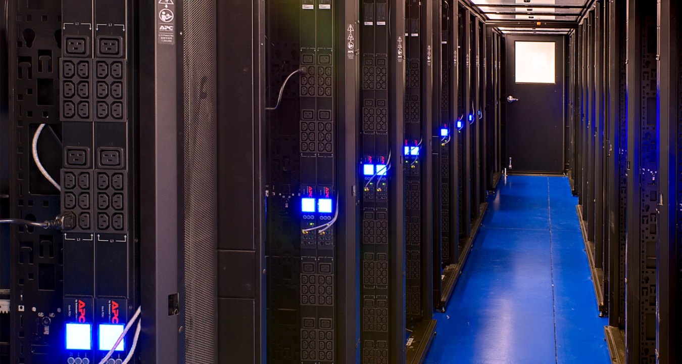 Indoor image of rows of data towers