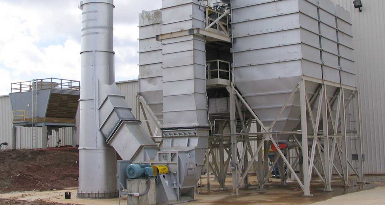 Outdoor image of the recycling plant with a metal tube