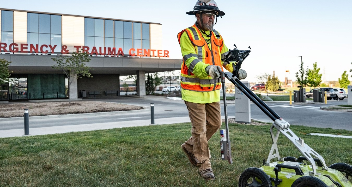 A man doing subsurface utility mapping