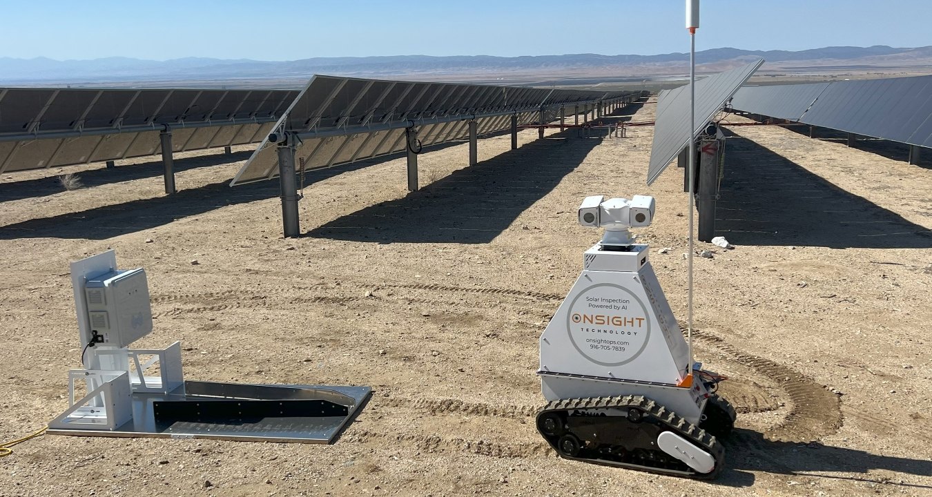 The OnSight Technology robot in front of solar panels