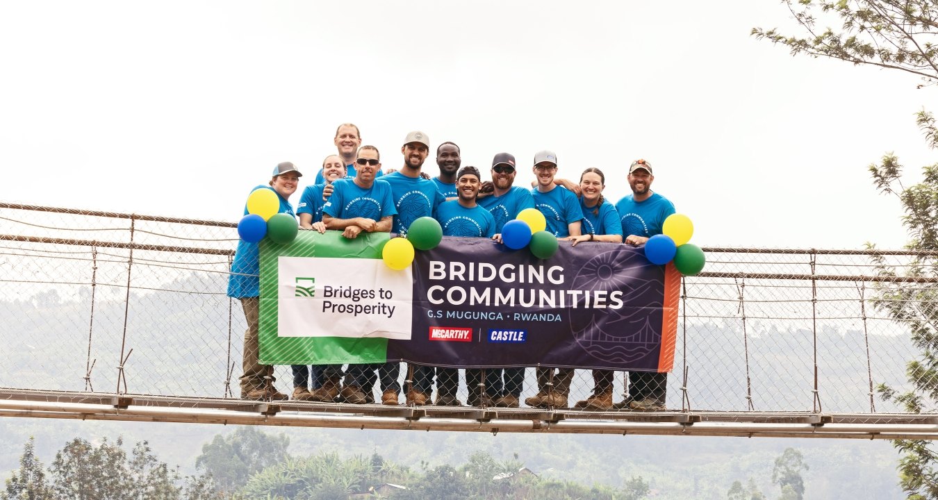 Group of people standing on a bridge