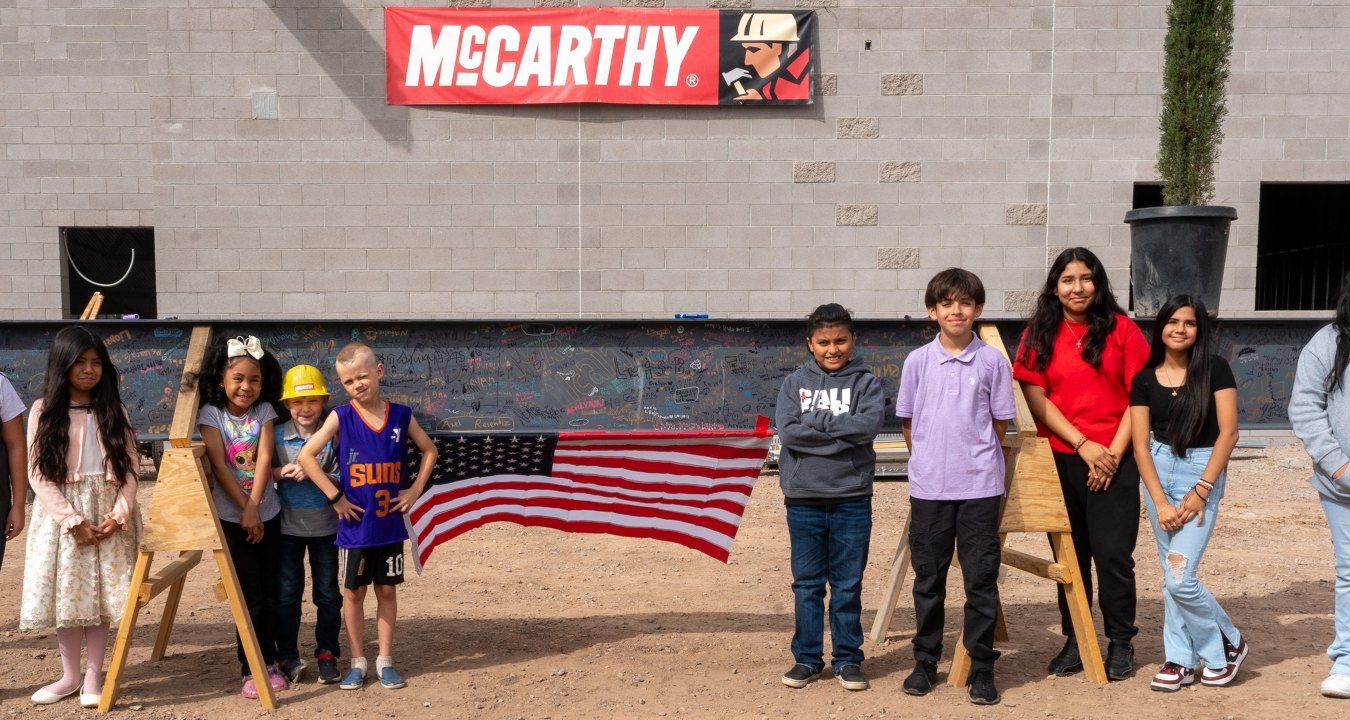 Children from Galveston Elementary standing outside the school