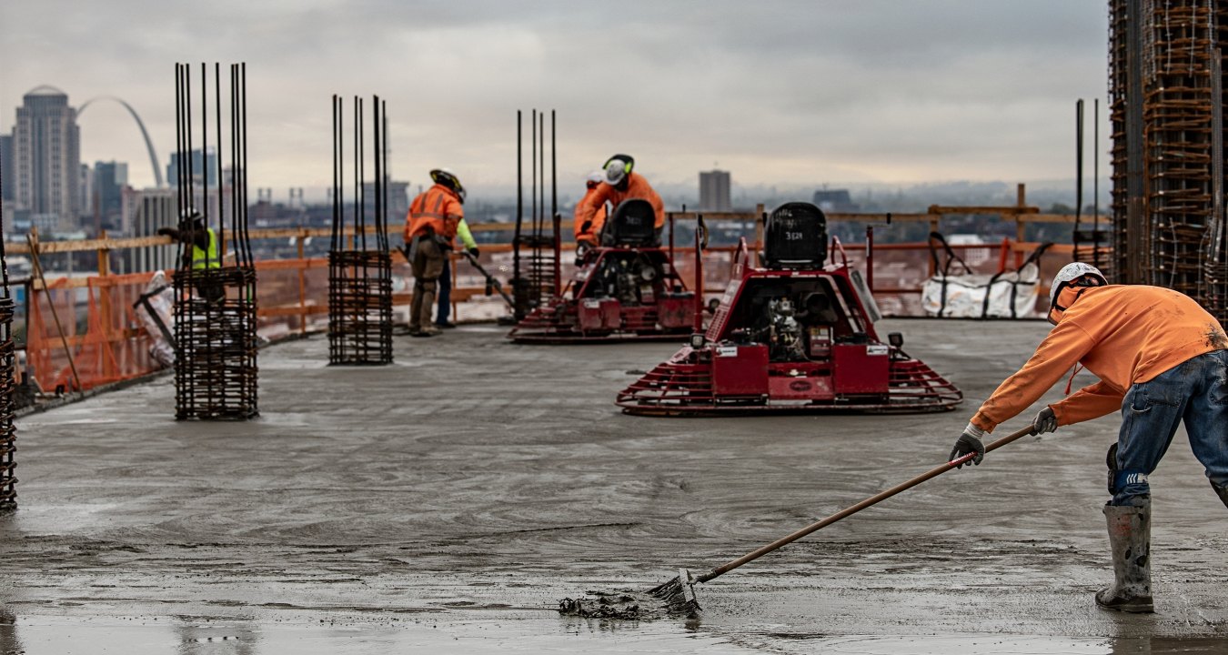 A McCarthy crew on a project with a cityscape view