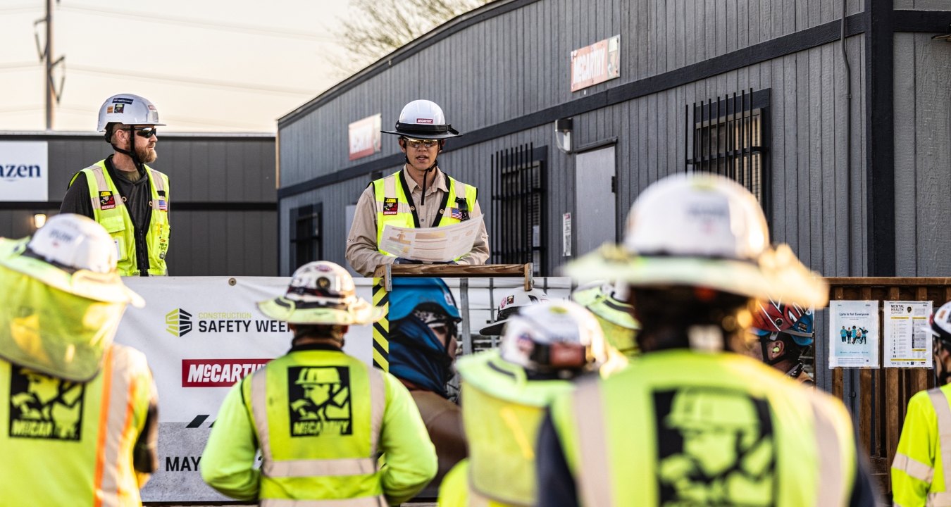 A group of people wearing PPE 