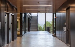 A hallway with elevators