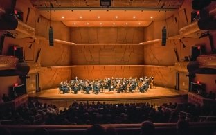 Chapman University Musco Center for the Arts Stage with Orchestra, Conductor and Audience Watching