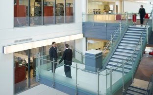 Edward Jones North Campus Building Interior with People on Stairway