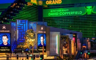 Closer exterior view of Hakkasan with the lion statue in front