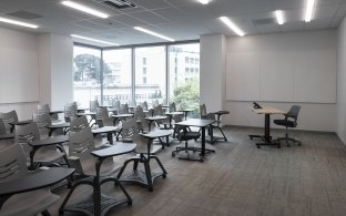 Classroom with individual desks and chairs.