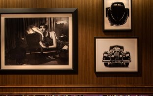 Roaring 20s Era Black & White Photos on Wall