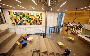 UC Davis — Betty Irene Moore Hall Atrium with stairs, color block art on wall