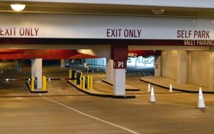 Image of the parking exit with signs and lanes