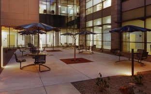 patio area with tables and umbrellas