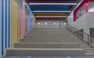 Stairway with colorful wall and ceiling panels at Buena Vista High School  