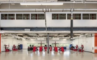 An open shop area with high ceilings and equipment