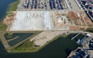 Another aerial view of the container yard with water on the left side of the photo
