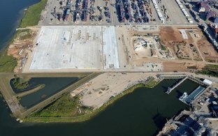 Another aerial view of the container yard with water on the left side of the photo