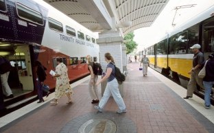 People getting on and off a train