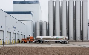 Outdoor image of the stacks and a truck in the loading dock