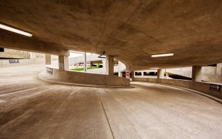 A concrete ramp inside of the garage