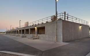 The concrete-walled exterior of a water treatment plant.