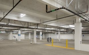 Interior parking lot with concrete pillars