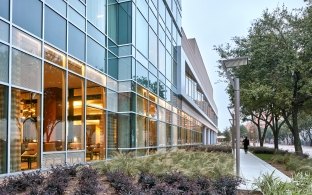 Outdoor image of the glass windows and landscaping