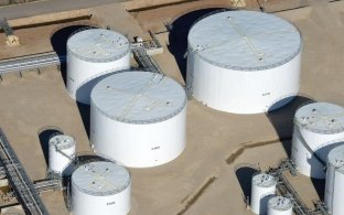 Multiple large, round tanks
