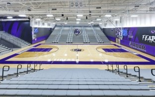 Millennium High School Gym view of the basketball court from top seating level