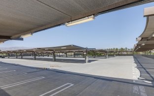 Outdoor image of the top of the garage with parking spaces