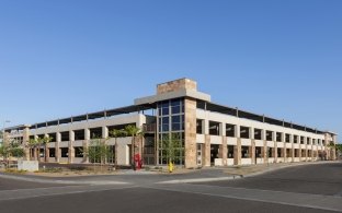 Outdoor image of the entire garage from a zoomed out spot with blue skies and no clouds