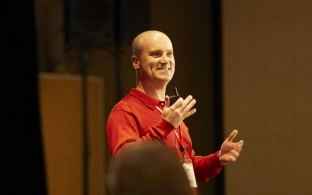 employee speaking in front of class