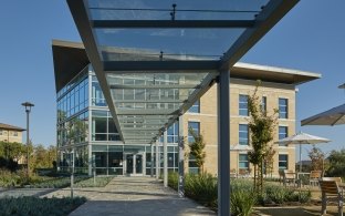 Walkway with glass overhang