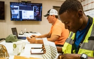 employees at desk together