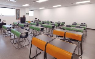 Indoor classroom with chairs and desks
