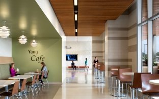 Indoor image of a modern cafe with tables and chairs