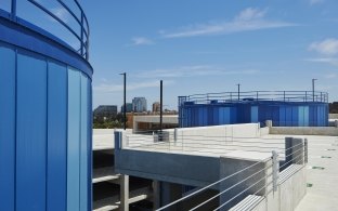 UCSD Athena Parking Structure top level with two Thermal Energy Storage (TES) tanks