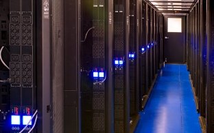 Indoor image of rows of data towers