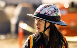 McCarthy construction worker wearing a helmet.