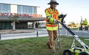 A man doing subsurface utility mapping