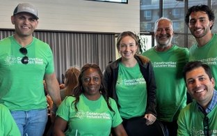 Group of people celebrating construction inclusion week at lunch