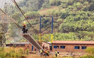 People working on constructing a bridge