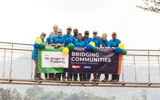 Group of people standing on a bridge