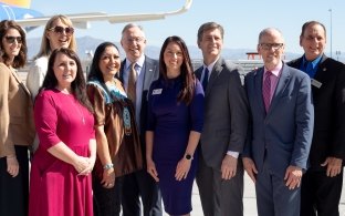 Project team at a ribbon cutting ceremony